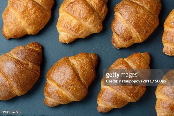 high angle view of croissants on table - alimentation background stock pictures, royalty-free photos & images