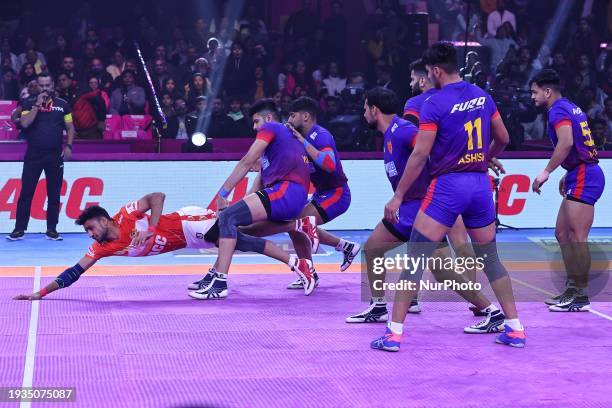 Prateek from the Gujarat Giants is in action during the Pro Kabaddi League season-10 match between Dabang Delhi and the Gujarat Giants at the SMS...