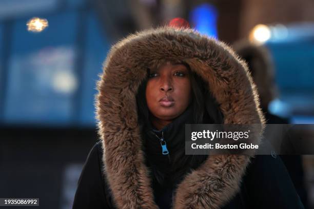 Boston, MA A commuter is bundled for the cold outside South Station.