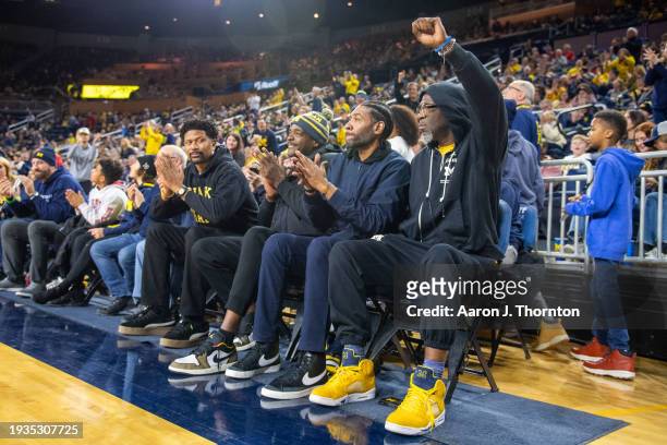 Former Michigan Wolverines Basketball Players Jalen Rose, Chris Webber, Jimmy King, and Ray Jackson attend a college basketball game between the...