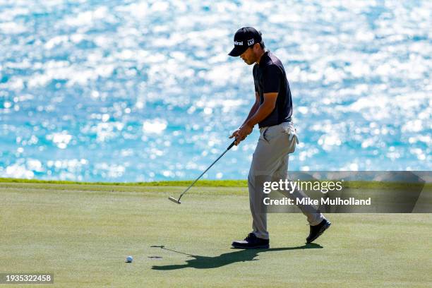 Satoshi Kodaira of Japan looks over a putt on the 16th hole during the second round of the The Bahamas Great Exuma Classic at Sandals Emerald Bay...