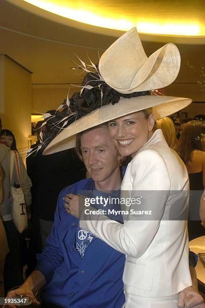 Philip Treacy and Jolyn Klinge attend a cocktail reception hosted by Cornelia Guest to honor Philip Treacy at the Bergdorf Goodman April 15, 2003 in...