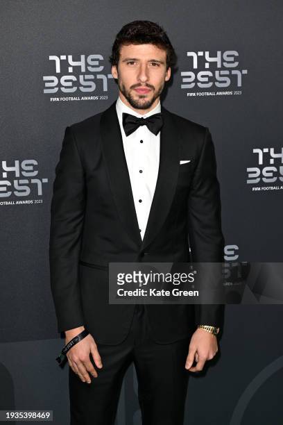 Footballer, Ruben Dias, arrives on the Green Carpet ahead of The Best FIFA Football Awards 2023 at The Apollo Theatre on January 15, 2024 in London,...