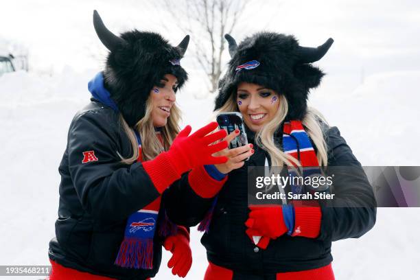 Fans take a selfie ahead of the AFC Wild Card Playoff game between the Pittsburgh Steelers and the Buffalo Bills at Highmark Stadium on January 15,...