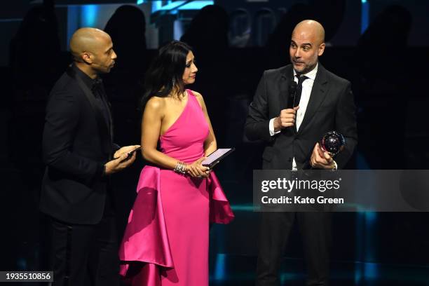 Presenters, Thierry Henry and Reshmin Chowdhury, speak with FIFA Men's Coach of the Year, Pep Guardiola, during the The Best FIFA Football Awards...