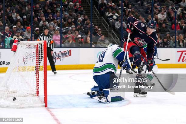 Dmitri Voronkov of the Columbus Blue Jackets deflects the puck into the back of the net during the second period against the Vancouver Canucks at...