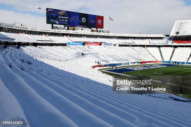 General view of snow filling the stands at Highmark Stadium before the game between the Pittsburgh Steelers and the Buffalo Bills on January 15, 2024...