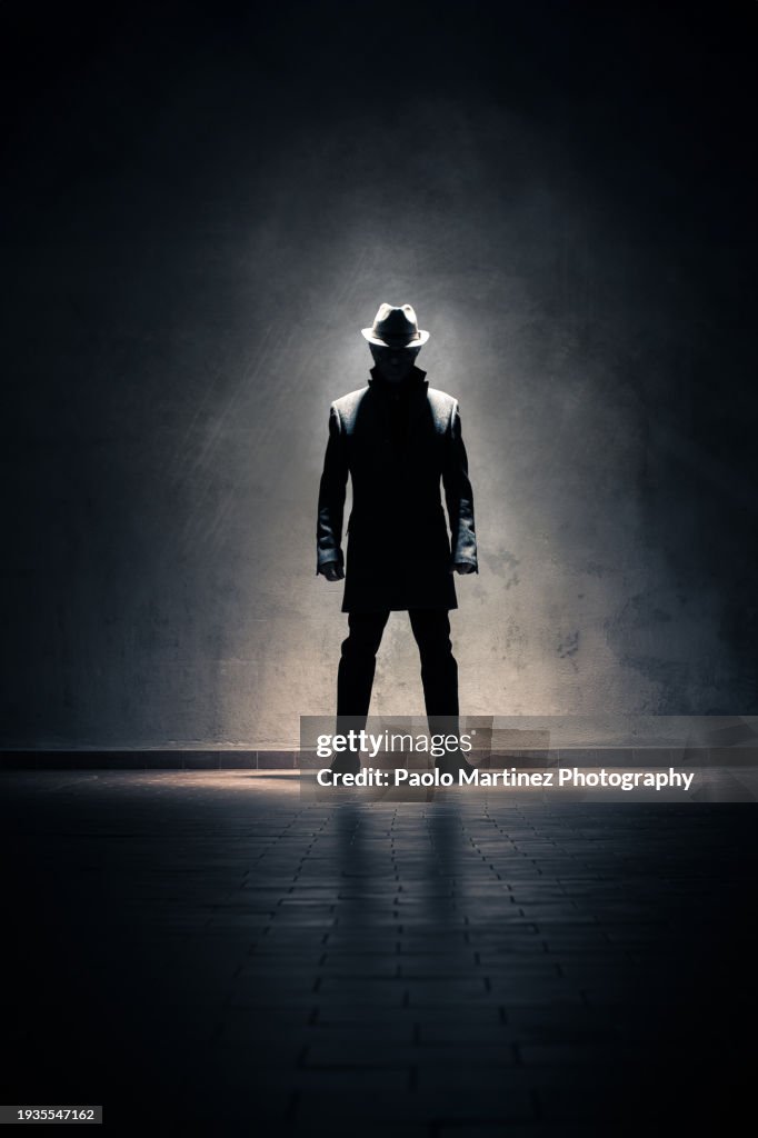 Gangster standing indoor