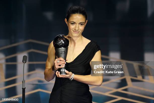 Best Women's Award Winner, Aitana Bonmati is seen with her trophy on stage during the The Best FIFA Football Awards 2023 at The Apollo Theatre on...