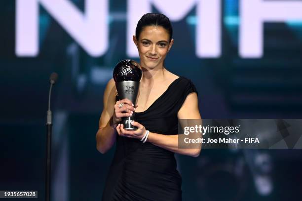 Best Women's Award Winner, Aitana Bonmati is seen with her trophy on stage during the The Best FIFA Football Awards 2023 at The Apollo Theatre on...