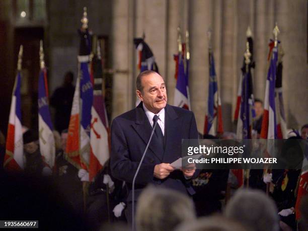 French President Jacques Chirac delivers a speech at the end of a mass for Genevieve De Gaulle-Anthonioz at Paris Notre Dame cathedral March 9, 2002....