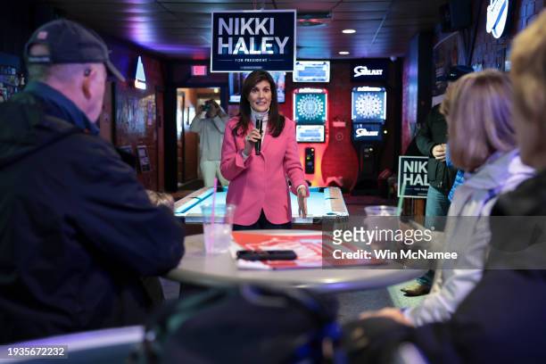 Republican presidential candidate former U.N. Ambassador Nikki Haley speaks to patrons during a campaign stop at PB's Pub January 15, 2024 in Newton,...