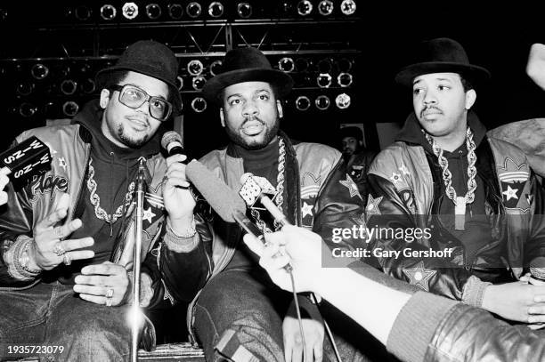 View, from left, of American Hip Hop musicians Darryl 'DMC' McDaniels, Jason 'Jam Master Jay' Mizell , and Joseph 'Run' Simmons, all of the group...