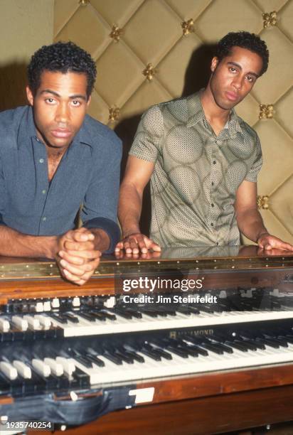 Duo Christion pose for a portrait at the Atlas Club in Los Angeles, California circa 1997.