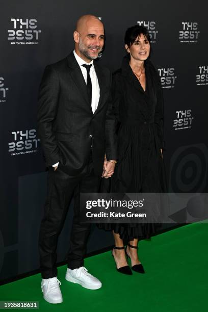 Football Manager, Pep Guardiola and Cristina Serra arrive on the Green Carpet ahead of The Best FIFA Football Awards 2023 at The Apollo Theatre on...