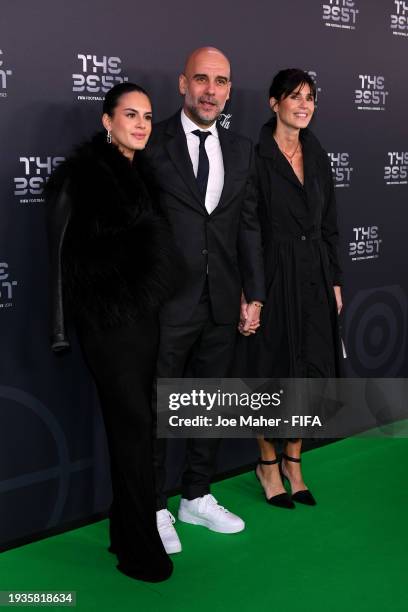 Football Manager, Pep Guardiola, Cristina Serra and Maria Guardiola arrive on the Green Carpet ahead of The Best FIFA Football Awards 2023 at The...