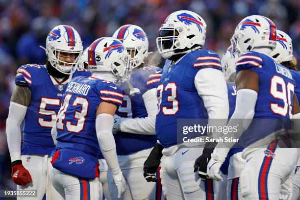 The Buffalo Bills defense looks on during the first quarter against the Pittsburgh Steelers at Highmark Stadium on January 15, 2024 in Orchard Park,...