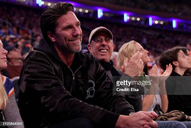 Former New York Ranger Henrik Lundqvist and comedian Jerry Seinfeld attend the game between the New York Knicks and the Orlando Magic at Madison...