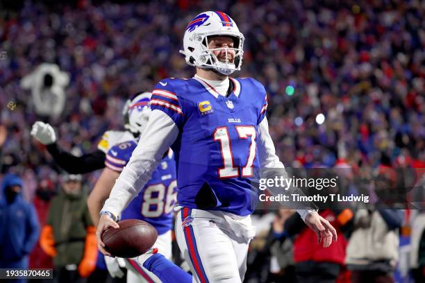Josh Allen of the Buffalo Bills celebrates his 52-yard touchdown against the Pittsburgh Steelers during the second quarter at Highmark Stadium on...