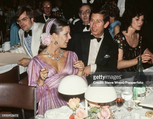 Prince Charles , Princess Caroline of Monaco and Julia Morley attending the International Variety Club convention in Monte Carlo, Monaco in May, 1977.