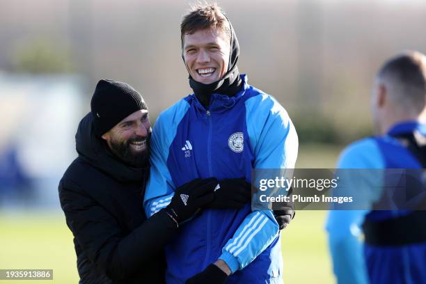 Jannik Vestergaard of Leicester City with Willy Caballero , Assistant manager of Leicester City during the Leicester City training session at...