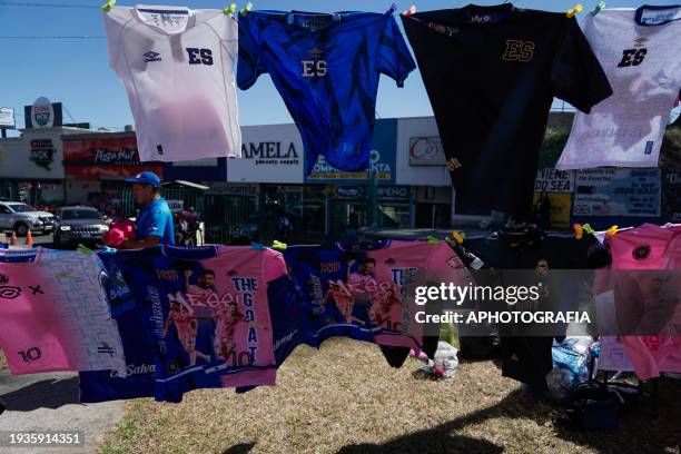 Jerseys of Miami FC and Salvador are displayed for sale on an avenue ahead of tomorrow's friendly match between El Salvador and Inter Miami on...