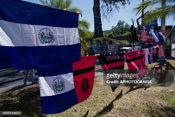 Flags of Salvador and Miami FC are displayed for sale at an avenue ahead of tomorrow's friendly match between El Salvador and Inter Miami on January...