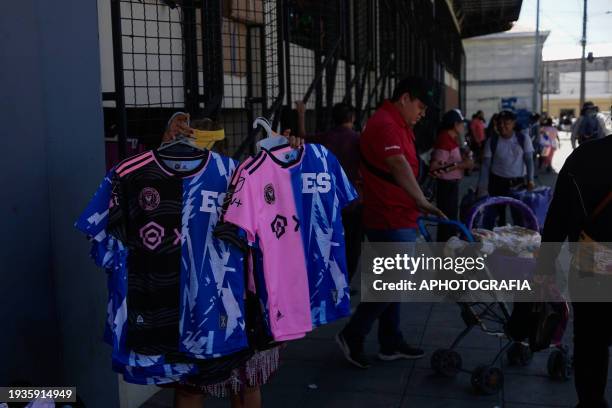 Street vendor sells jerseys of Argentine player Lionel Messi of Miami FC in the historic center market ahead of tomorrow's friendly match between El...