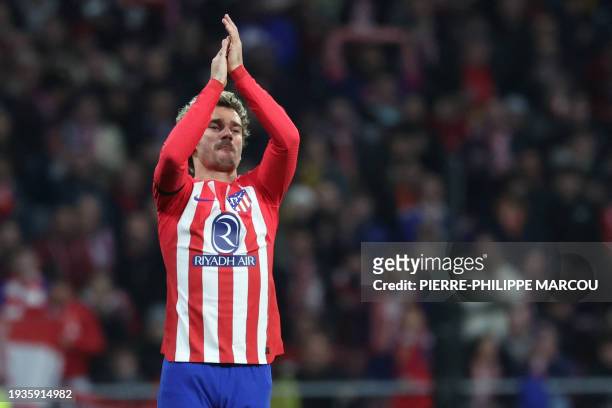 Atletico Madrid's French forward Antoine Griezmann acknowledges supporters before the Spanish Copa del Rey football match between Club Atletico de...