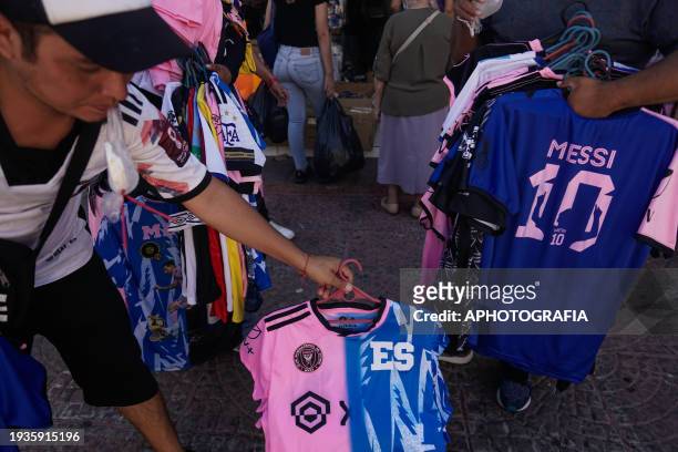 Street vendor sells jerseys of Argentine player Lionel Messi of Miami FC in the historic center market ahead of tomorrow's friendly match between El...