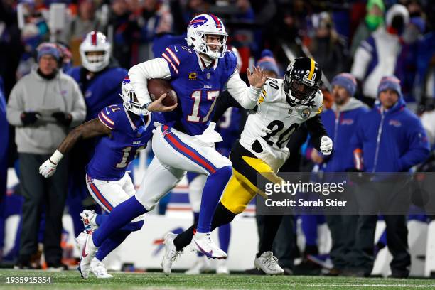 Josh Allen of the Buffalo Bills scores a 52-yard touchdown against the Pittsburgh Steelers during the second quarter at Highmark Stadium on January...