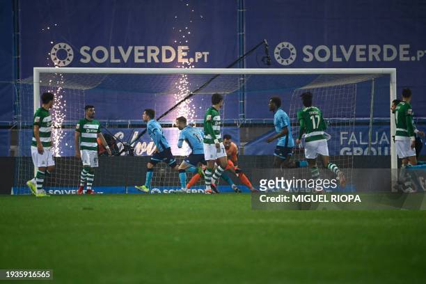 Vizela's Spanish forward Alberto Soro celebrates scoring his team's first goal during the Portuguese League football match between FC Vizela and...