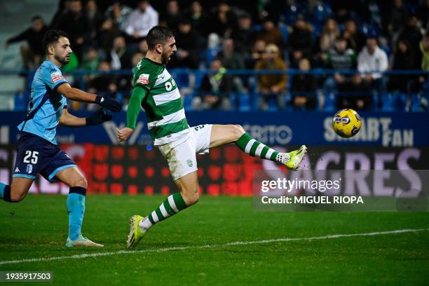 Sporting Lisbon's Portuguese forward Paulinho Dias Fernandes kicks the ball during the Portuguese League football match between FC Vizela and...