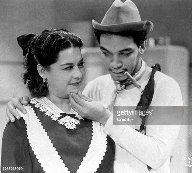 This photo shows Mario Moreno "Cantinflas," when the actor was probably in his 40's. Fotografia de Mario Moreno "Cantinflas" en el curso del rodaje...