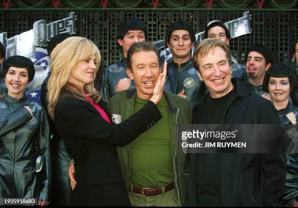 Characters from the movie "Galaxy Quest", Sigourney Weaver , Tim Allen and Alan Rickman , pose for the premiere of the science fiction, action comedy...