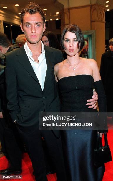 British actor Jude Law arrives at the premiere of his new film "The Talented Mr Ripley" with his partner British actress Sadie Frost , in Los...