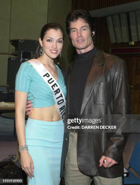 Zoraida Fonalledas , Miss Puerto Rico 2000, poses for a photograph with Ronn Moss, star of the soap opera "The Bold and Beautiful," 06 May 2000 in...