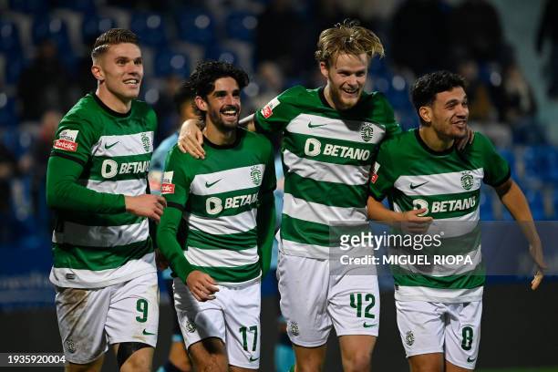 Sporting Lisbon's Swedish forward Viktor Gyokeres celebrates scoring his team's fifth goal with teammates during the Portuguese League football match...