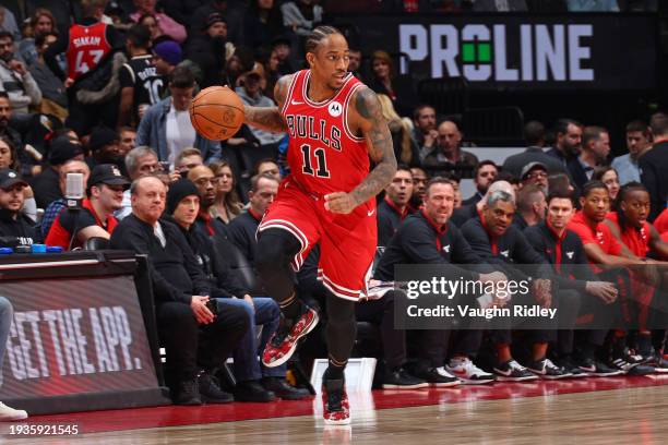 DeMar DeRozan of the Chicago Bulls dribbles the ball during the game against the Toronto Raptors on January 18, 2024 at the Scotiabank Arena in...