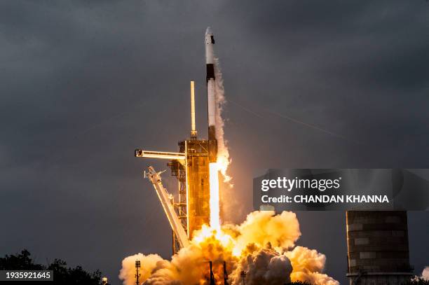 SpaceX Falcon 9 rocket with its Crew Dragon capsule launches from pad LC-39A during Axiom Mission Three at the Kennedy Space Center, in Cape...