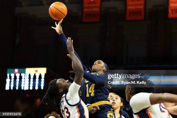 Bransford of the Notre Dame Fighting Irish shoots over Alexia Smith of the Virginia Cavaliers in the first half during a game at John Paul Jones...