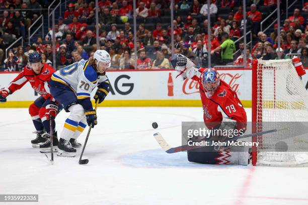 Charlie Lindgren of the Washington Capitals makes a save on a shot by Oskar Sundqvist of the St. Louis Blues during a game at Capital One Arena on...
