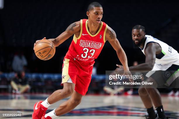 January 18: Malcolm Hill of the Birmingham Squadron dribbles the ball during the game against the Iowa wolves at Legacy Arena in Birmingham, AL on...