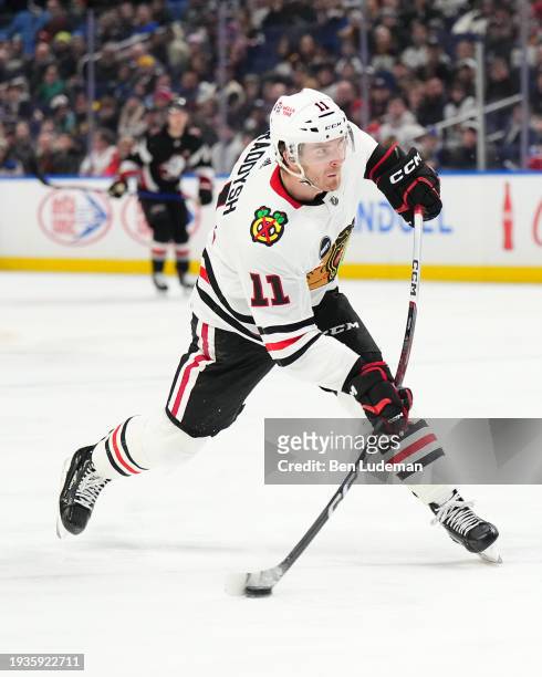 Taylor Raddysh of the Chicago Blackhawks shoots the puck on net during an NHL game against the Buffalo Sabres on January 18, 2024 at KeyBank Center...