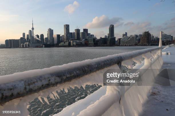 Toronto skyline is seen as ice builds up along Polson Pier while temperatures hovered around -2 C highs and -10 C lows on January 18, 2024 in...