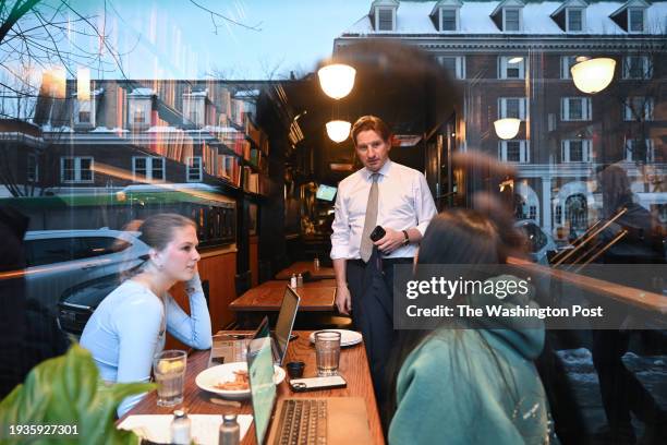 Representative Dean Phillips greets people at Murphy's before Phillips held a campaign event at Hanover Inn Dartmouth on Thursday January 18, 2024 in...