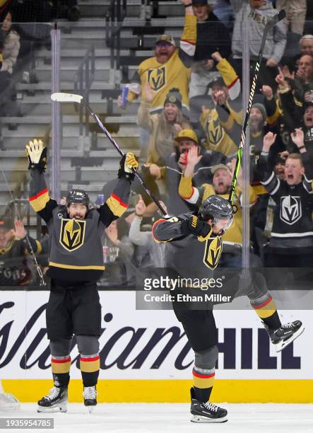 Chandler Stephenson and Mark Stone of the Vegas Golden Knights celebrate after Stone scored a goal against the Nashville Predators in the first...