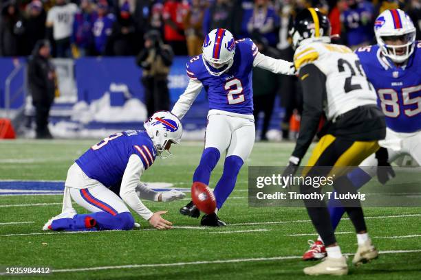 Tyler Bass of the Buffalo Bills kicks a field goal during the third quarter against the Pittsburgh Steelers at Highmark Stadium on January 15, 2024...