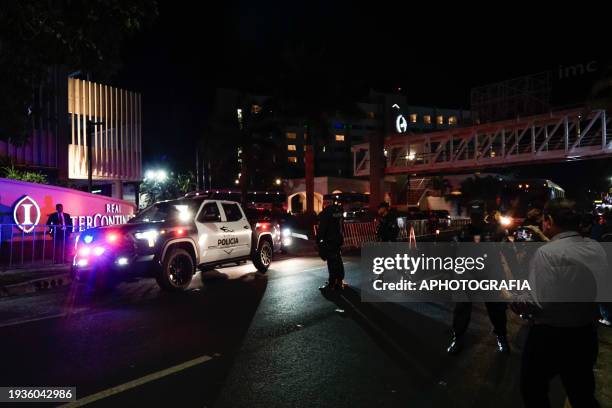 Police guard the hotel before the arrival of the Inter Miami team at the Real Intercontinental Hotel prior to the friendly game against the El...