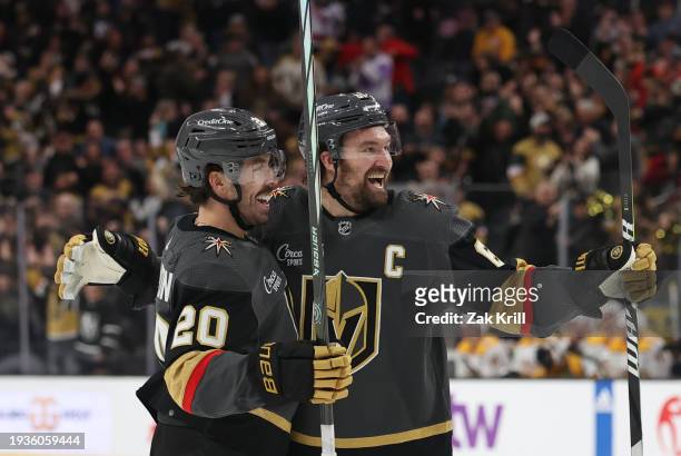 Mark Stone of the Vegas Golden Knights celebrates with teammates after recording a hat trick with his third goal of the game during the second period...